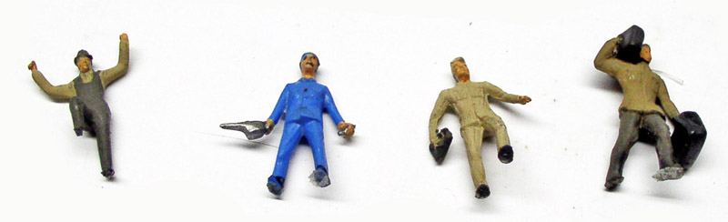 Quatre figurines miniatures peintes de cheminots et ouvriers pour locomotive Big Boy