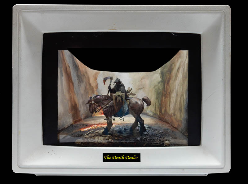 Boîte à diorama blanche présentant le guerrier Death Dealer à cheval brandissant une hache