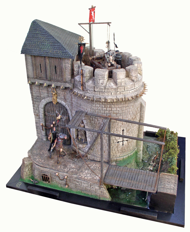 Maquette de donjon médiéval avec tour crénelée, pont-levis et figurines de cavaliers