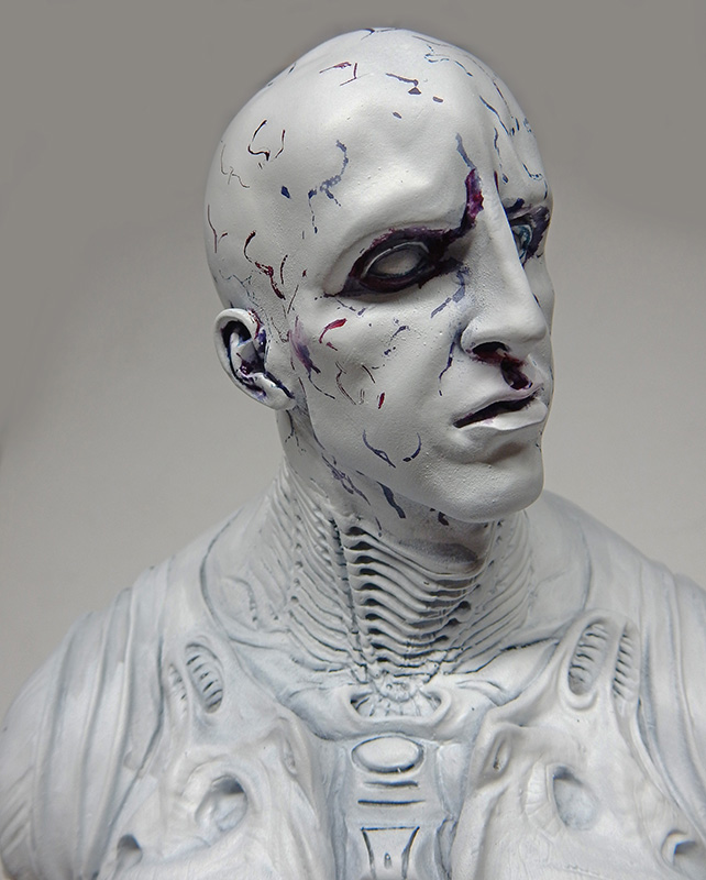 Buste peint d'un Ingénieur de Prometheus au crâne chauve et veines bleutées