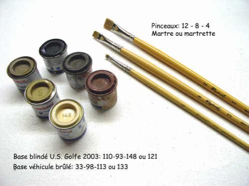 Pots de peinture Humbrol et pinceaux plats utilisés pour peindre un blindé Abrams