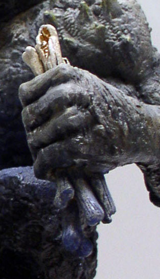 Conan affrontant l'homme mangeur, figurines de maquette peintes dans un décor de tutoriel