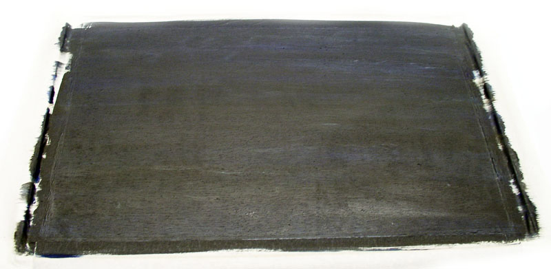 Plaque de base rectangulaire peinte en gris foncé aux bords effilochés pour maquette