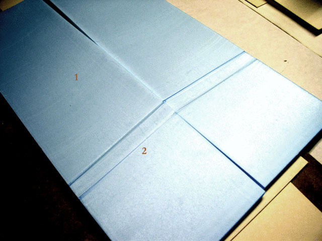 Plaque de polystyrène extrudé bleu marquée des repères 1 et 2 pour la découpe