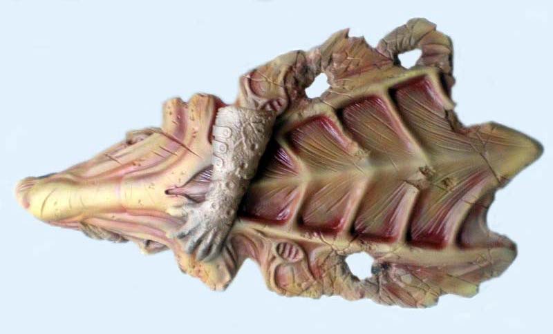 Pièce de figurine Predator peinte représentant le torse musclé et la colonne vertébrale