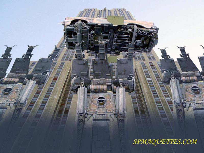 Photomontage de maquette Space Chevy intégrée à une gigantesque structure science-fiction vue en contre-plongée